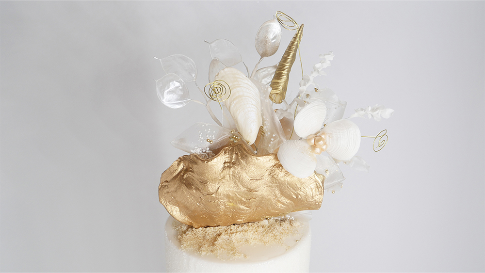 Golden wedding cake top